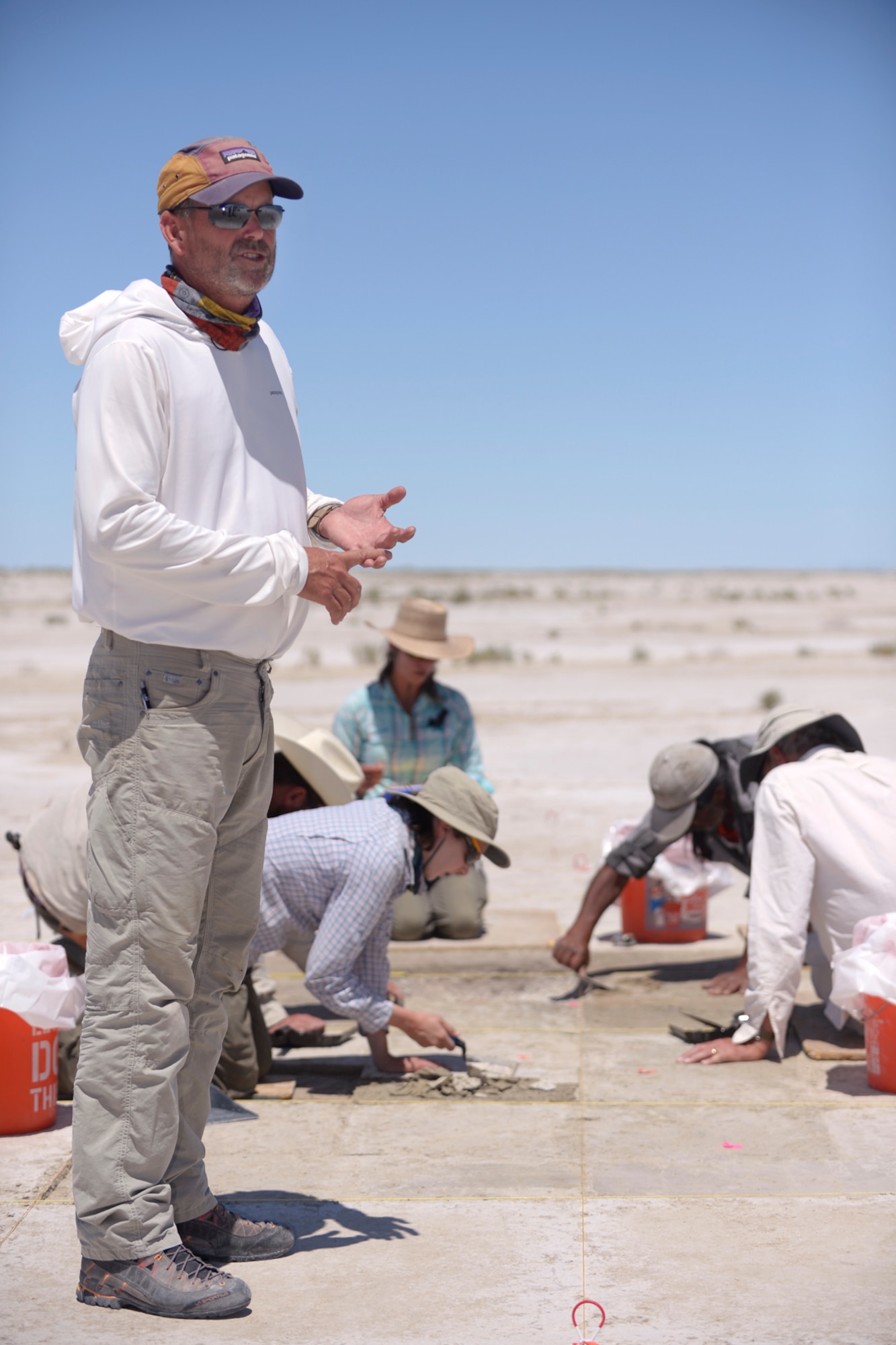 D. Craig Young, Far Western Anthropological Research Group geoarchaeologist, talks with media while team members excavate an archaeological site on the Utah Test and Training Range, July 13, 2016. The site, located on Utah’s West Desert, has provided artifacts which archaeologists believe point to the presence of wetlands and humans more than 12,000 years ago. (U.S. Air Force photo by Todd Cromar) 