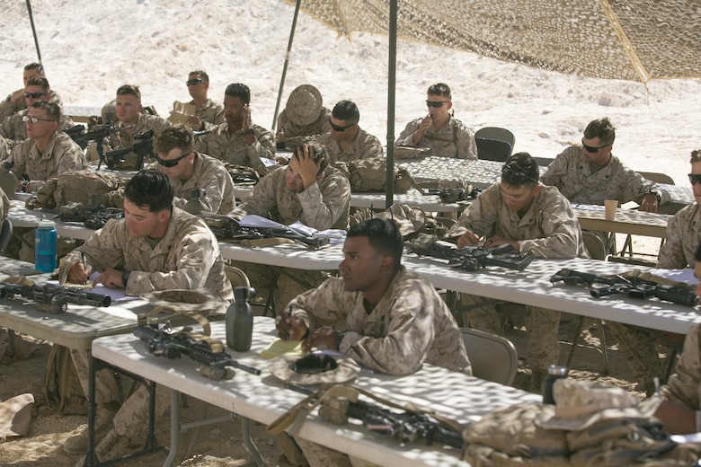 Marines with 3rd Battalion, 4th Marines, 7th Marine Regiment, learn about patrolling techniques during the Tactical Small Unit Leaders’ Course held aboard Marine Corps Air Ground Combat Center, Twentynine Palms, Calif., July 14, 2016. (Official Marine Corps photo by Cpl. Thomas Mudd/Released)
