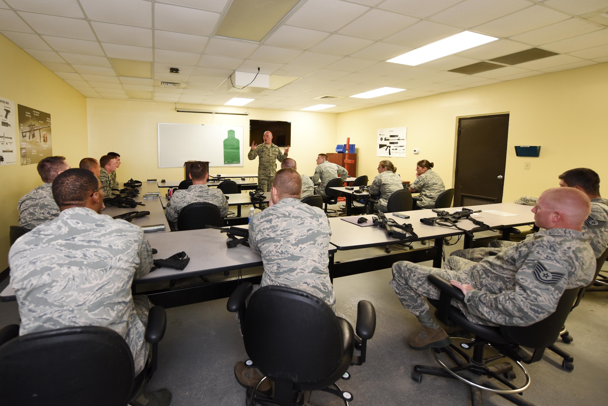 Staff Sgt. James Campbell, 4th Security Forces Squadron Combat Arms Training and Maintenance instructor, explains the basic fundamentals of a weapon during a CATM class July 18, 2016, at Seymour Johnson Air Force Base, North Carolina. Campbell has more than five years of instructing experience. (U.S. Air Force photo by Airman Miranda A. Loera)