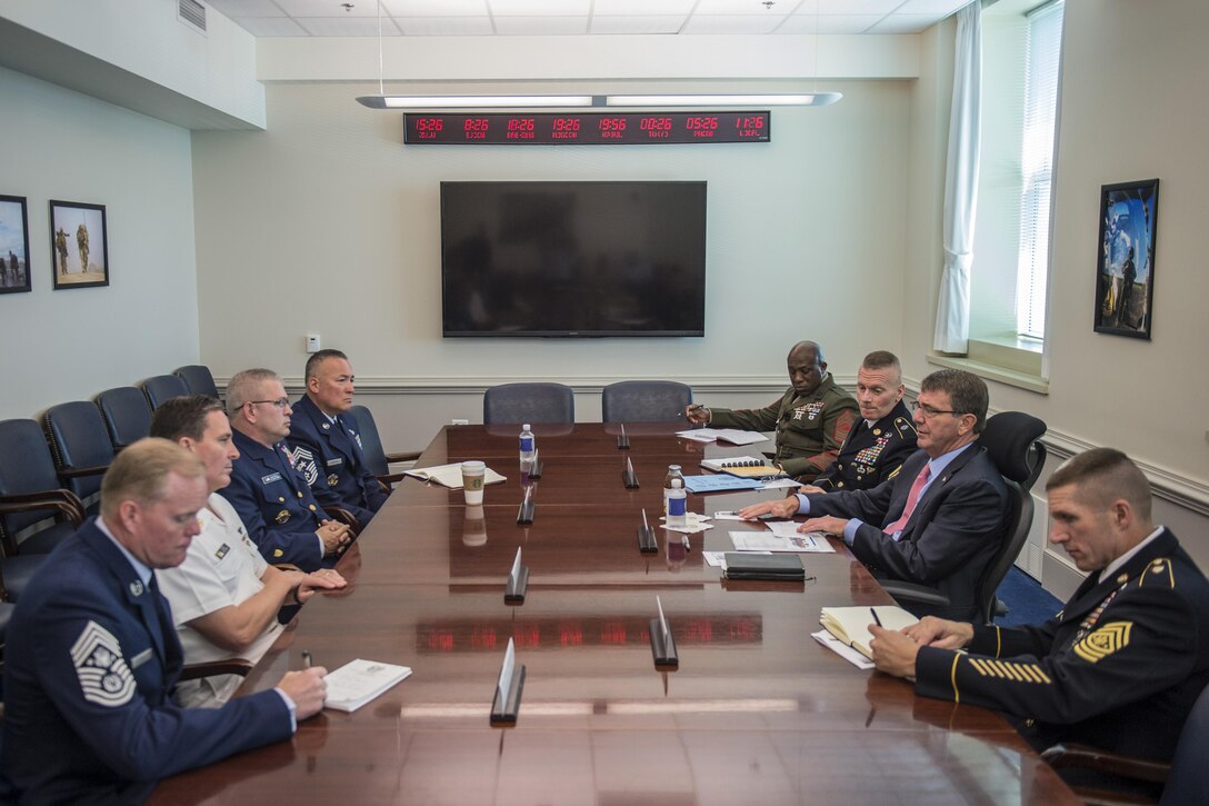 Defense Secretary Ash Carter meets with the senior enlisted members from the Joint Chiefs, Army, Marine Corps, Navy, Air Force, National Guard and Coast Guard at the Pentagon, July 22, 2016. Left front to back are: Chief Master Sgt. of the Air Force James A. Cody; Master Chief Petty Officer of the Navy Michael D. Stevens; Master Chief Petty Officer of the Coast Guard Steven W. Cantrell; and Air Force Chief Master Sgt. Mitchell O. Brush, senior enlisted advisor for the National Guard Bureau. Right front to back are: Sgt. Maj. of the Army Daniel A. Dailey; Carter; Army Command Sgt. Maj. John W. Troxell, senior enlisted advisor to the chairman of the Joint Chiefs of Staff; and Sgt. Maj. of the Marine Corps Ronald L. Green. DoD photo by Air Force Tech. Sgt. Brigitte N. Brantley


