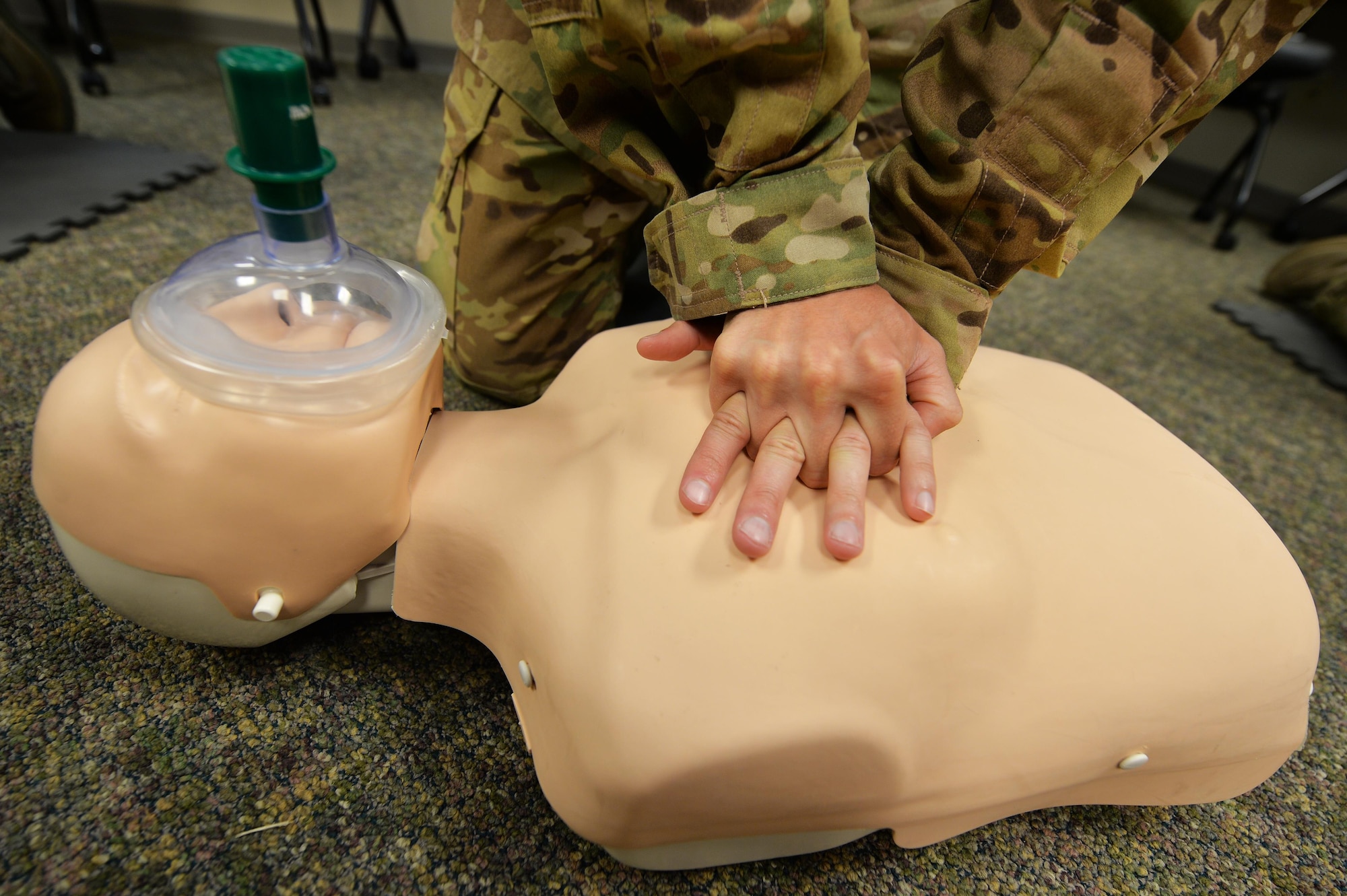 An Air Commando practices chest compressions on a CPR dummy at Hurlburt Field, Fla., July 22, 2016. The 1st Special Operations Medical Operations Squadron has 80 CPR instructors who teach close to 240 classes a year, which certifies nearly 350 individuals every quarter. (U.S. Air Force photo by Senior Airman Andrea Posey)