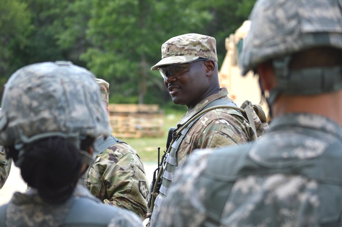 Army Reserve Chief Warrant Officer 2 Gerald Crumlin, 4-410th  Brigade Support Battalion, Ft. Knox, conducts an after action review (AAR) for the day's exercise during Warrior Exercise (WAREX) 86-16-03 at Fort McCoy, Wis., July 20, 2016. WAREX is designed to keep Soldiers all across the United States ready to deploy. (U.S. Army photo by Thomas Watters/Released)