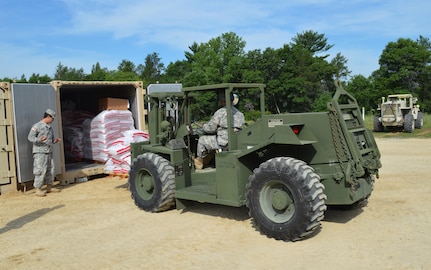 Army Reserve Spc. Edward J. Green, of 282nd Quartermaster Company, Montgomery, Al., maneuvers a forklift during Warrior Exercise (WAREX) 86-16-03 at Fort McCoy, Wis., July 19, 2016. WAREX is designed to keep Soldiers all across the United States ready to deploy.  (U.S. Army photo by Spc. Joseph Driver/Released)