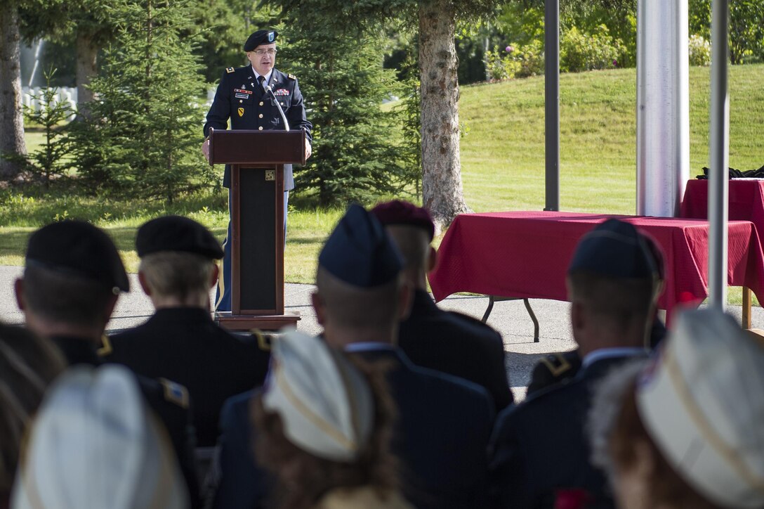 U.S Army Chaplain (Lt. Col.) Greg Thogmartin, U.S Army Alaska, Command Chaplain, Joint Base Elmendorf-Richardson, speaks during a Gold Star Wives of America memorial ceremony at the Fort Richardson National Cemetery, July 15, 2016.  The memorial ceremony was a part of the Gold Star Wives of America's 71st National Convention held this year in Anchorage, Alaska. 