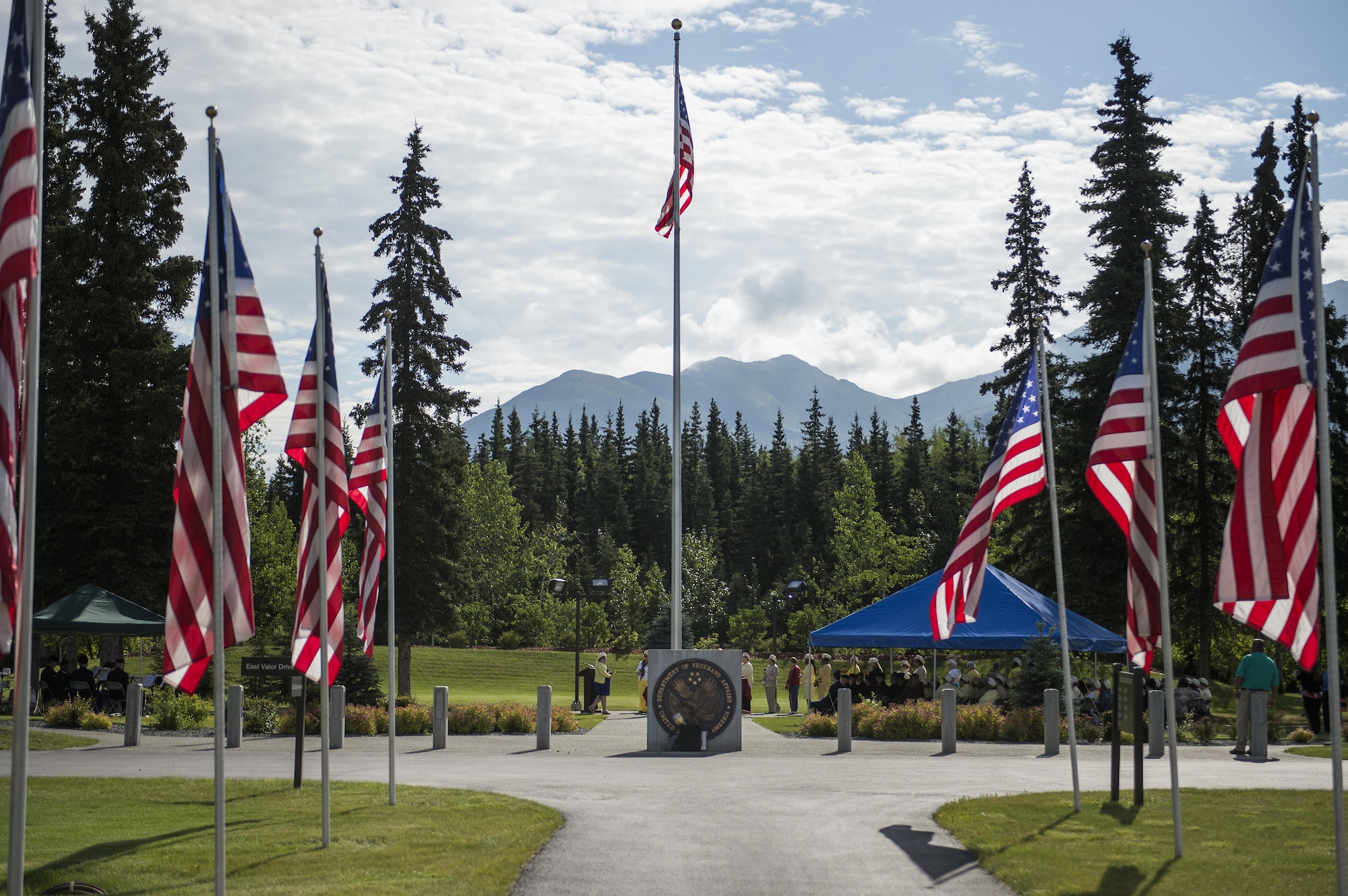 Gold Star Wives of America honor their fallen spouses during a memorial ceremony at the the Fort Richardson National Cemetery, July 15, 2016 on Joint Base Elmendorf-Richardson, Alaska.  The memorial ceremony was a part of the Gold Star Wives of America's 71st National Convention hosted this year in Anchorage, Alaska.