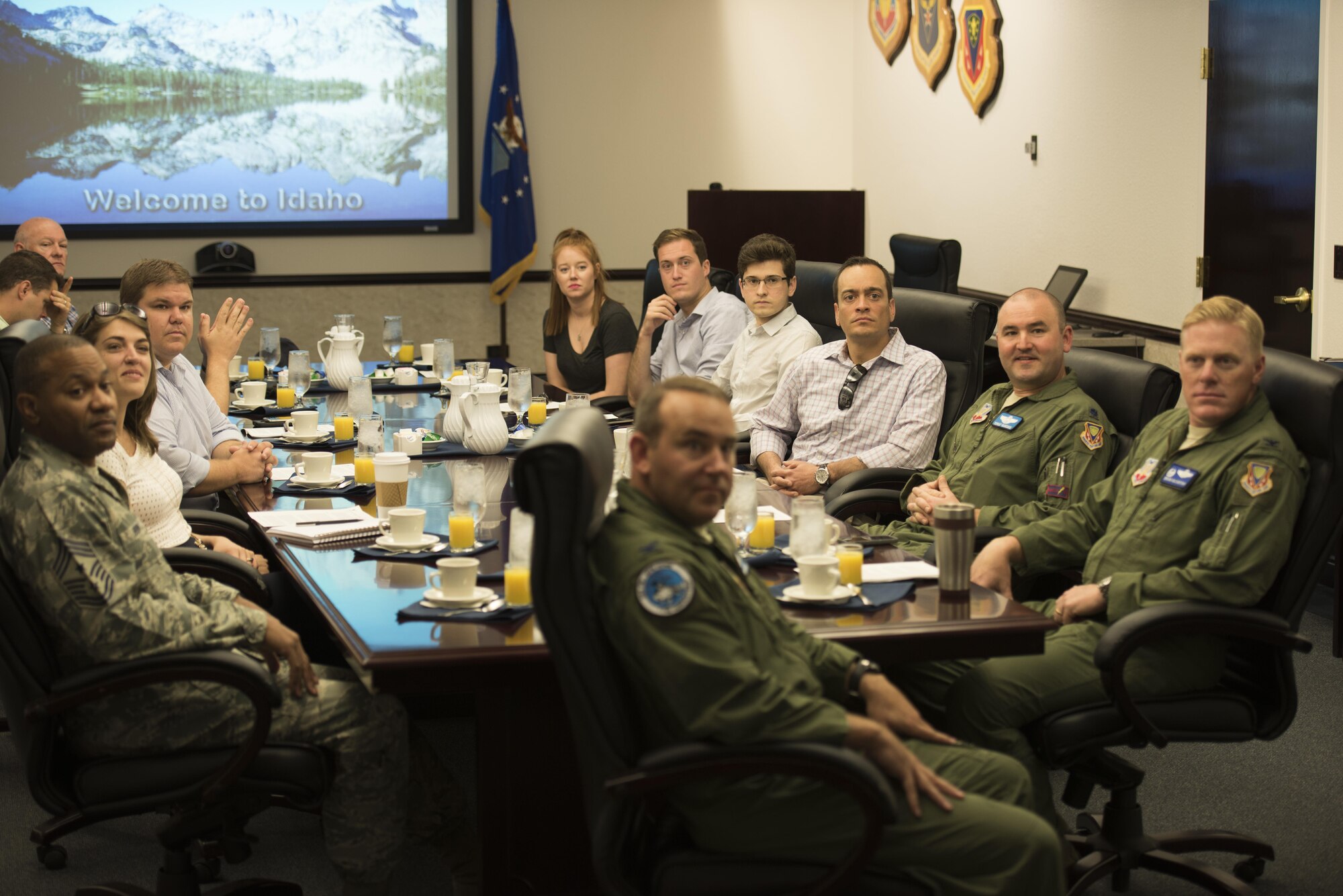 Congressional advisors attend a mission briefing at Mountain Home Air Force Base, Idaho, July 19, 2016. Col. David Brynteson, 366th Fighter Wing vice commander, discussed topics such as air operation capabilities, wing vision and the history of the base. (U.S. Air Force photo by Airman Alaysia Berry/Released)