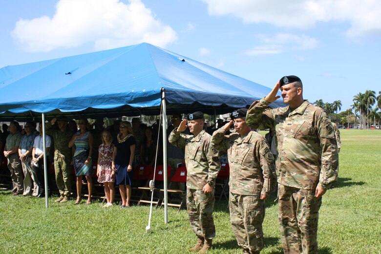 Pacific Ocean Division Commander Col. Peter B. Andrysiak (right), U.S. Army Corps of Engineers Commanding General, Lt. Gen. Todd T. Semonite, and outgoing Division Commander Brig. Gen. Jeffrey L. Milhorn, salute during the presentation of the colors at the USACE Pacific Ocean Division Change of Command ceremony July 12 on Palm Circle at Fort Shafter. At the ceremony Andrysiak became the 32nd commander of the Pacific Ocean Division, U.S. Army Corps of Engineers. 