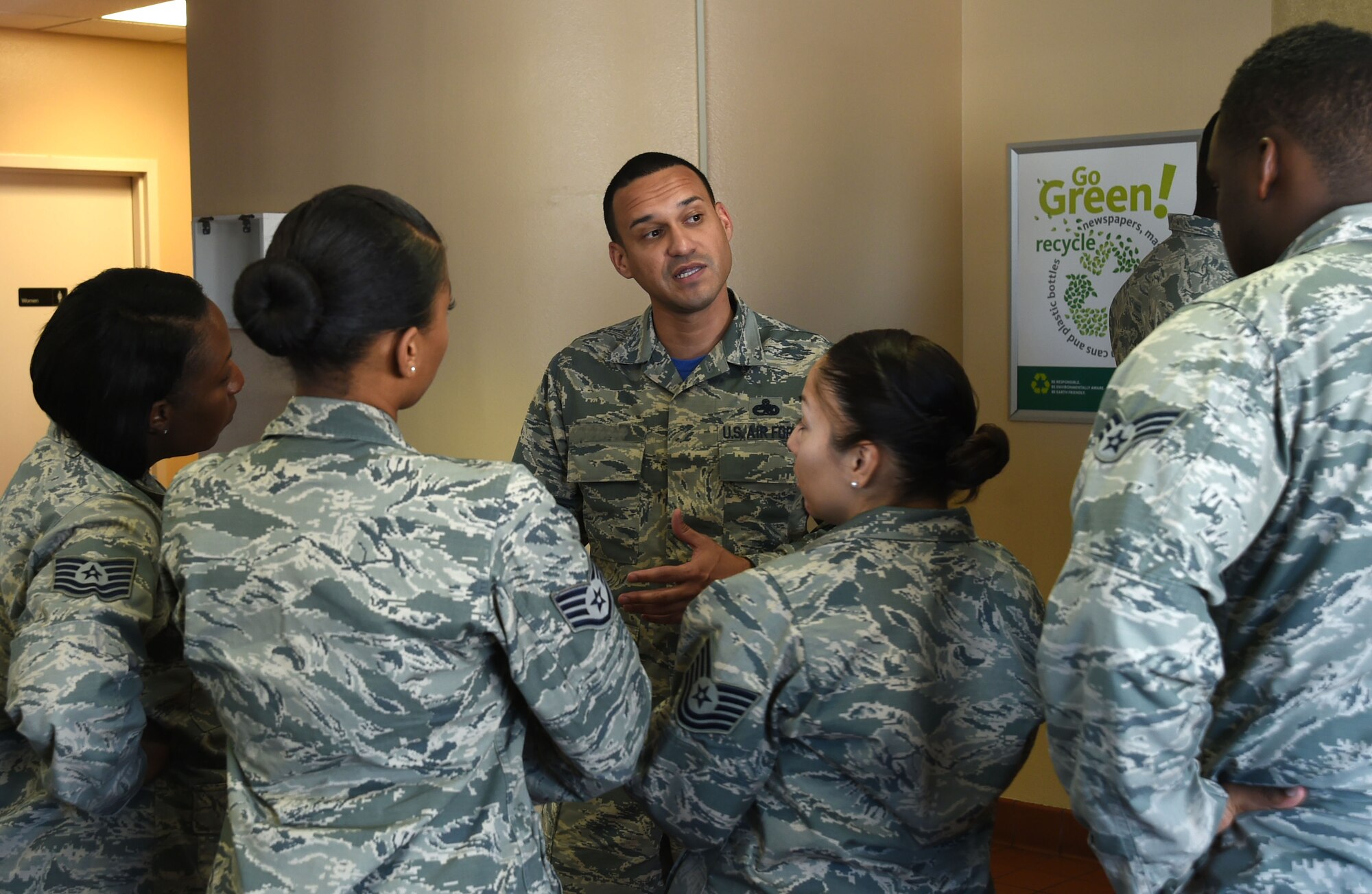 Master Sgt. Nathaniel, 432nd Wing/432nd Air Expeditionary Wing first sergeant, explains the importance of Operation Warm Heart to other Airmen July 15, 2016 at Creech Air Force Base, Nevada.  Operation Warm Heart is a nonprofit organization created to help Airmen and their families of the community in times of emergency and financial crisis. (U.S. Air Force photo by Airman 1st Class James Thompson/Released) 