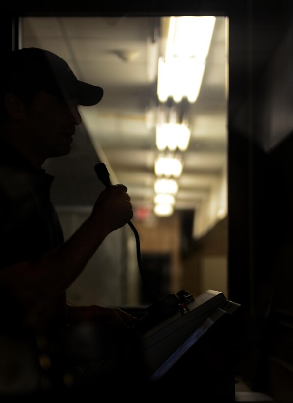 Mr. Paolino Caliendo, 7th Bomb Wing Judge Advocate attorney advisor, gives safety and firing commands at the firing range July 8, 2016, at Dyess Air Force Base, Texas. A beta test for the Shooting Proficiency program was recently conducted at Dyess as part of an initiative to give service members the opportunity to recreationally use their personal firearms at the base combat arms training and maintenance firing range. (U.S. Air Force photo by Airman 1st Class April N. Lancto/Released) 