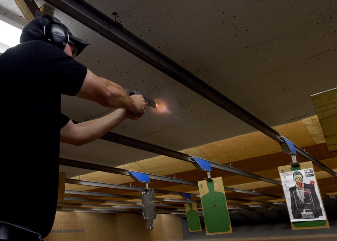 U.S. Air Force Master Sgt. Justin Rahe, 7th Bomb Wing Wing inspections superintendent, fires at his target July 8, 2016, at Dyess Air Force Base, Texas. Rahe participated in Dyess’ initial beta test of the Shooting Proficiency program, an initiative that allows service members to use their personal firearms at the base’s combat arms training and maintenance firing range. (U.S. Air Force photo by Senior Airman Alexander Guerrero/Released)

