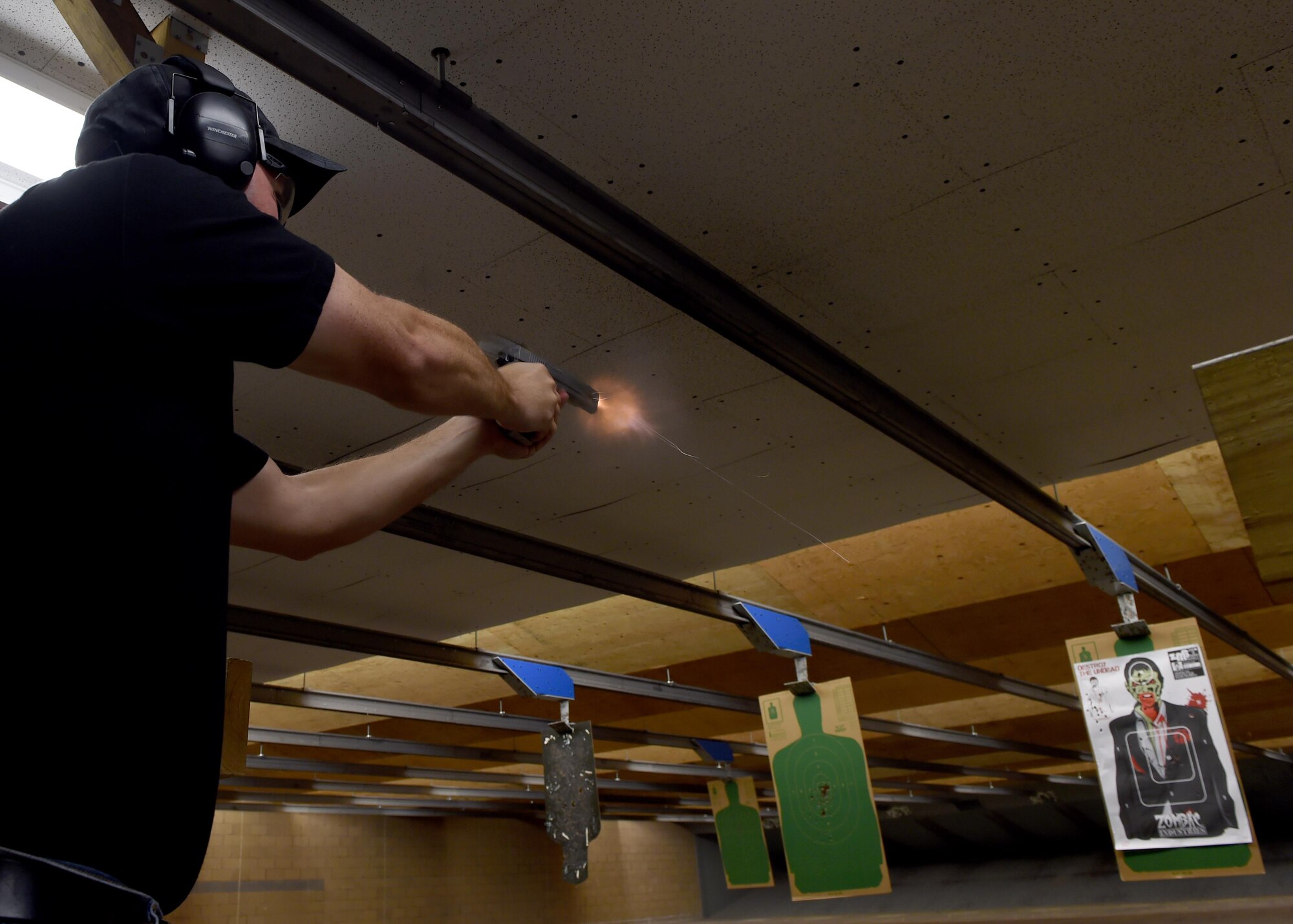 U.S. Air Force Master Sgt. Justin Rahe, 7th Bomb Wing Wing inspections superintendent, fires at his target July 8, 2016, at Dyess Air Force Base, Texas. Rahe participated in Dyess’ initial beta test of the Shooting Proficiency program, an initiative that allows service members to use their personal firearms at the base’s combat arms training and maintenance firing range. (U.S. Air Force photo by Senior Airman Alexander Guerrero/Released)

