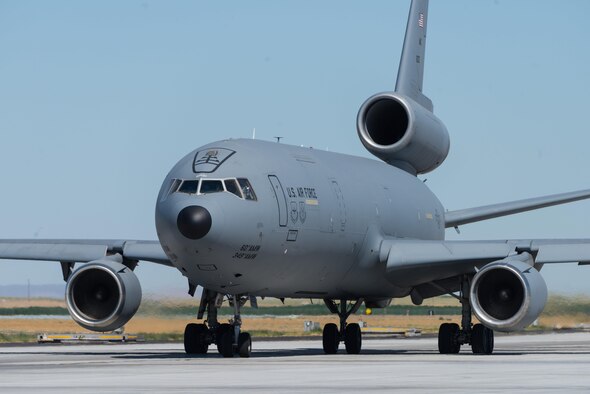 A KC-10 Extender from Travis Air Force Base, California rolls down the taxiway at Mountain Home Air Force Base, Idaho, July 20, 2016. “Heavies” such as the KC-10 fulfill multiple different roles in downrange scenarios such as air refueling, personnel and cargo transport and even reconnaissance. (U.S. Air Force photo by Senior Airman Connor J. Marth/RELEASED)