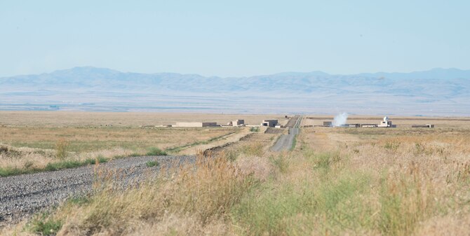 A MC-76 training ordnance is dropped in a simulated city at Saylor Creek Range Complex, July 20, 2016. Marine Joint Terminal Attack Coordinators from Marine Corps Air Ground Combat Center Twentynine Palms, California came to train during Gunfighter Flag, a quarterly multi-national exercise at Mountain Home Air Force Base, Idaho. (U.S. Air Force photo by Senior Airman Malissa Lott/RELEASED)