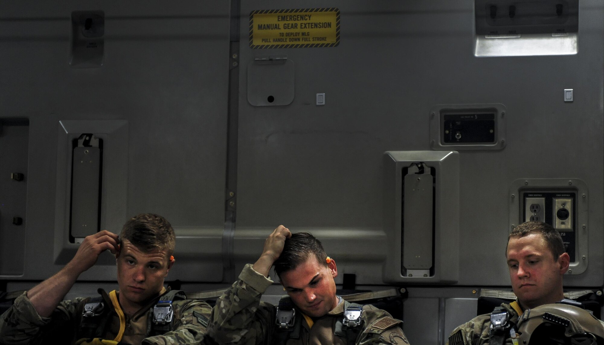 Survival Evasion Resistance Escape specialists, assigned to the 414th Combat Training Squadron Nellis Air Force Base, Nev., wait for take-off on a C-17 during Red Flag 16-3 July 20, 2016. The air-to-air combat training exercise is conducted over the 2.9 million acre Nevada Test and Training Range. (U.S. Air Force photo by Airman 1st Class Kevin Tanenbaum/Released)