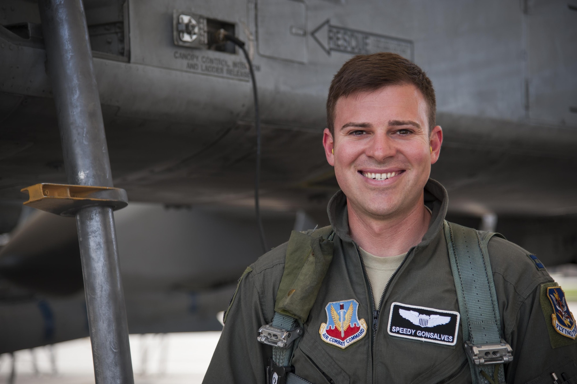 U.S. Air Force Capt. Erik Gonsalves, 75th Fighter Squadron A-10C Thunderbolt II pilot, poses for a photo prior to his final flight at the 75th FS, June 27, 2016, at Moody Air Force Base, Ga. Gonsalves was recently selected to serve as Thunderbird 8, the advance pilot and narrator for the United States Air Force Aerial Demonstration Team.  (U.S. Air Force photo by Andrea Jenkins/Released)
