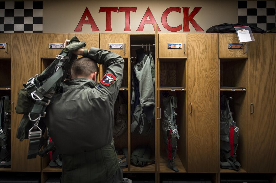 U.S. Air Force Capt. Erik Gonsalves, 75th Fighter Squadron A-10C Thunderbolt II pilot, suits up prior to his final flight with the 75th FS, June 27, 2016, at Moody Air Force Base, Ga. Gonsalves, a 2008 U.S. Air Force Academy graduate, has six years of experience in the cockpit of an A-10C. This flight marks the last time he will fly an A-10C before transitioning to the Thunderbird’s well-known F-16C/D Fighting Falcon. (U.S. Air Force photo by Senior Airman Ryan Callaghan/Released)

