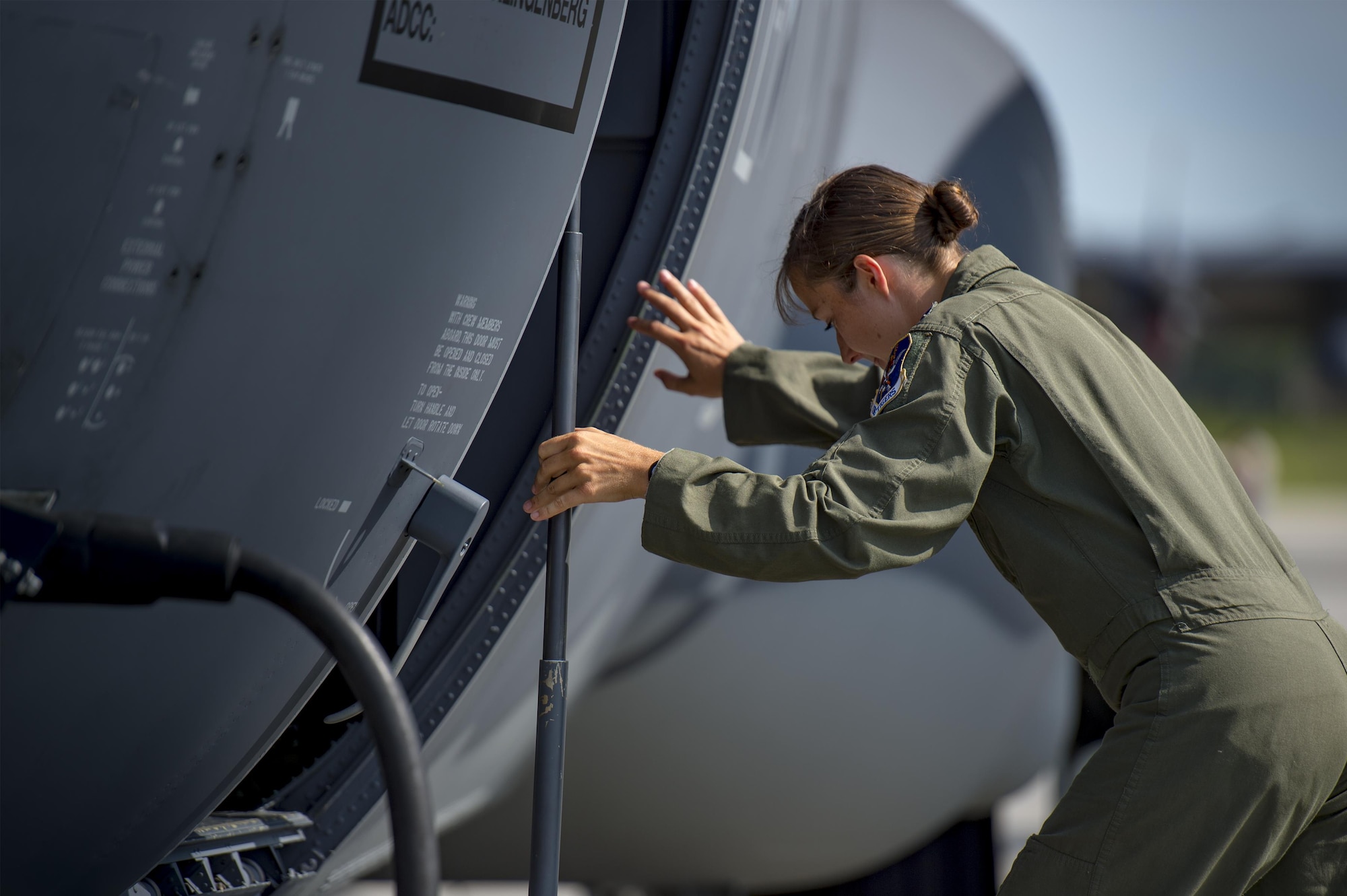 U.S. Air Force Capt. Christy Wise, 71st Rescue Squadron pilot, climbs into an HC-130J Combat King II for her first flight since becoming an above-the-knee amputee, July 22, 2016, at Moody Air Force Base, Ga. Wise underwent nearly 15 months of rehabilitation before she was cleared to fly. (U.S. Air Force Photo by Senior Airman Ryan Callaghan)
