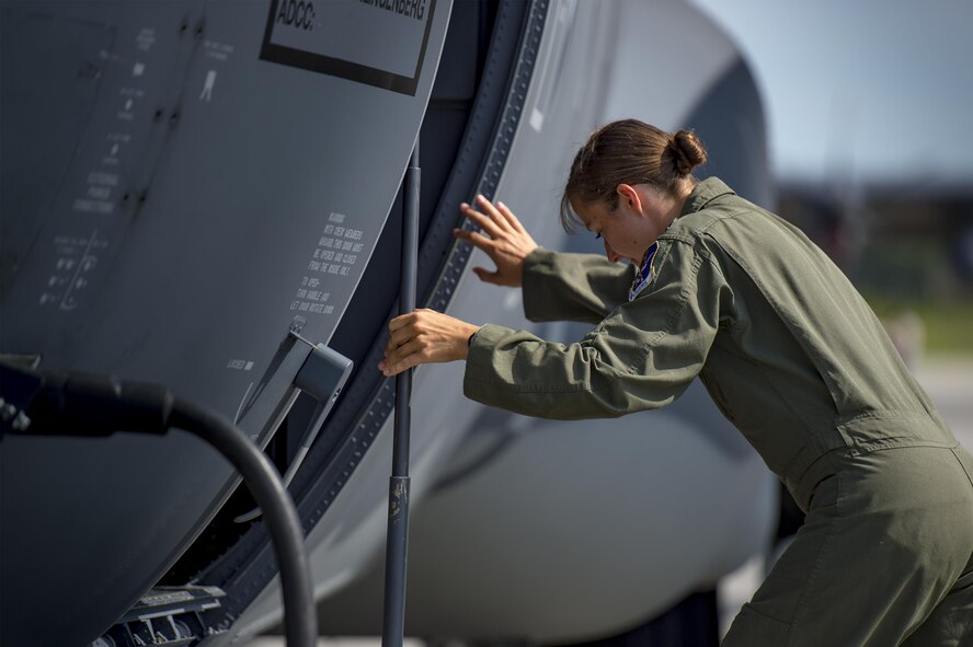 U.S. Air Force Capt. Christy Wise, 71st Rescue Squadron pilot, climbs into an HC-130J Combat King II for her first flight since becoming an above-the-knee amputee, July 22, 2016, at Moody Air Force Base, Ga. Wise underwent nearly 15 months of rehabilitation before she was cleared to fly. (U.S. Air Force Photo by Senior Airman Ryan Callaghan)
