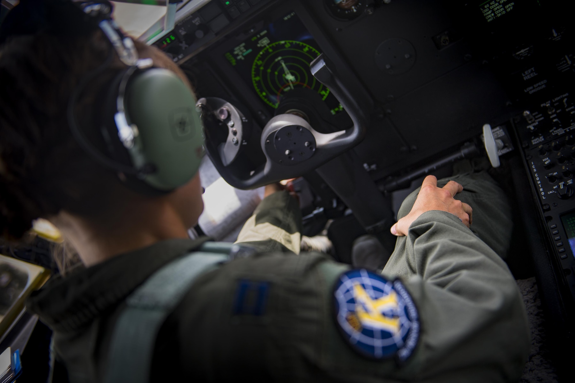 U.S. Air Force Capt. Christy Wise, 71st Rescue Squadron pilot, adjusts her prosthetic leg prior to taxiing in an HC-130J Combat King II, July 22, 2016, at Moody Air Force Base, Ga.  Wise is the first female to return to the pilot seat following an amputation. (U.S. Air Force Photo by Senior Airman Ryan Callaghan)
