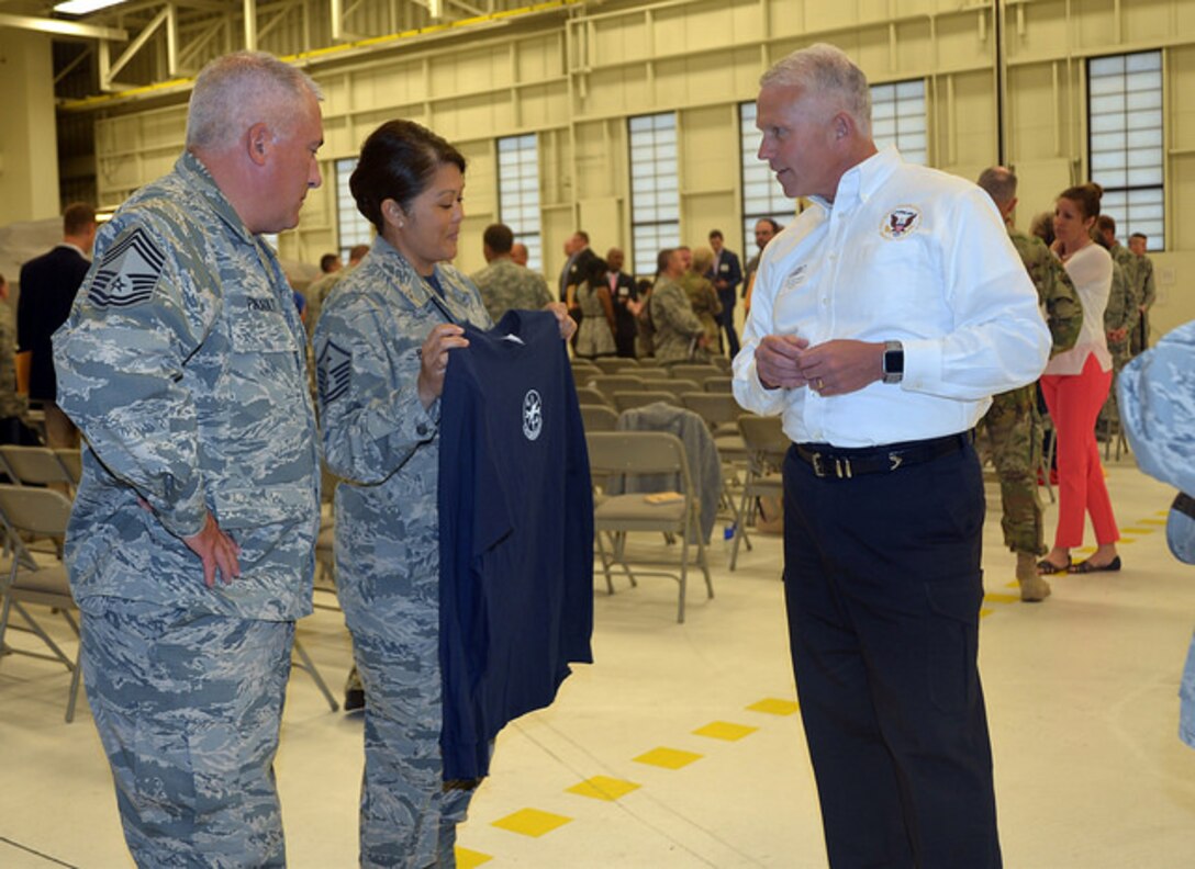 Honorary Commanders partnered with the 477th Fighter Group participated in an induction ceremony July 22, 2016 on Joint Base Elmendorf-Richardson, AK. The honorary commanders program pairs local citizens with commanders in order to foster relationships and cooperation between community leaders and military members. This year's inductees included Timothy Andrew, Principal at Creekside Park Elementary, Anne Garret, Director of Marketing and Development for the Alaska Center for the Performing Arts and Clint Johnson, Alaska Region Chief for the National Transportation Safety Board.