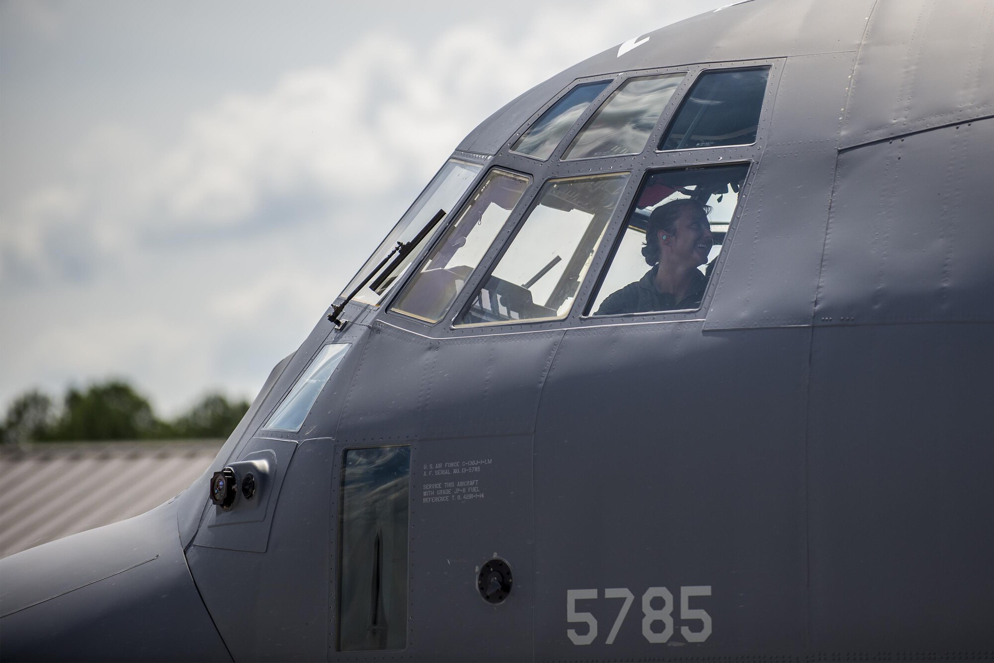 U.SU.S. Air Force Capt. Christy Wise,71st Rescue Squadron pilot, laughs in the cockpit of an HC-130J Combat King II after returning from her requalification flight, July 22, 2016, at Moody Air Force Base, Ga. Wise credited other amputees, who have become her mentors, for her quick return to the sky. (U.S. Air Force photo by Airman Daniel Snider)
