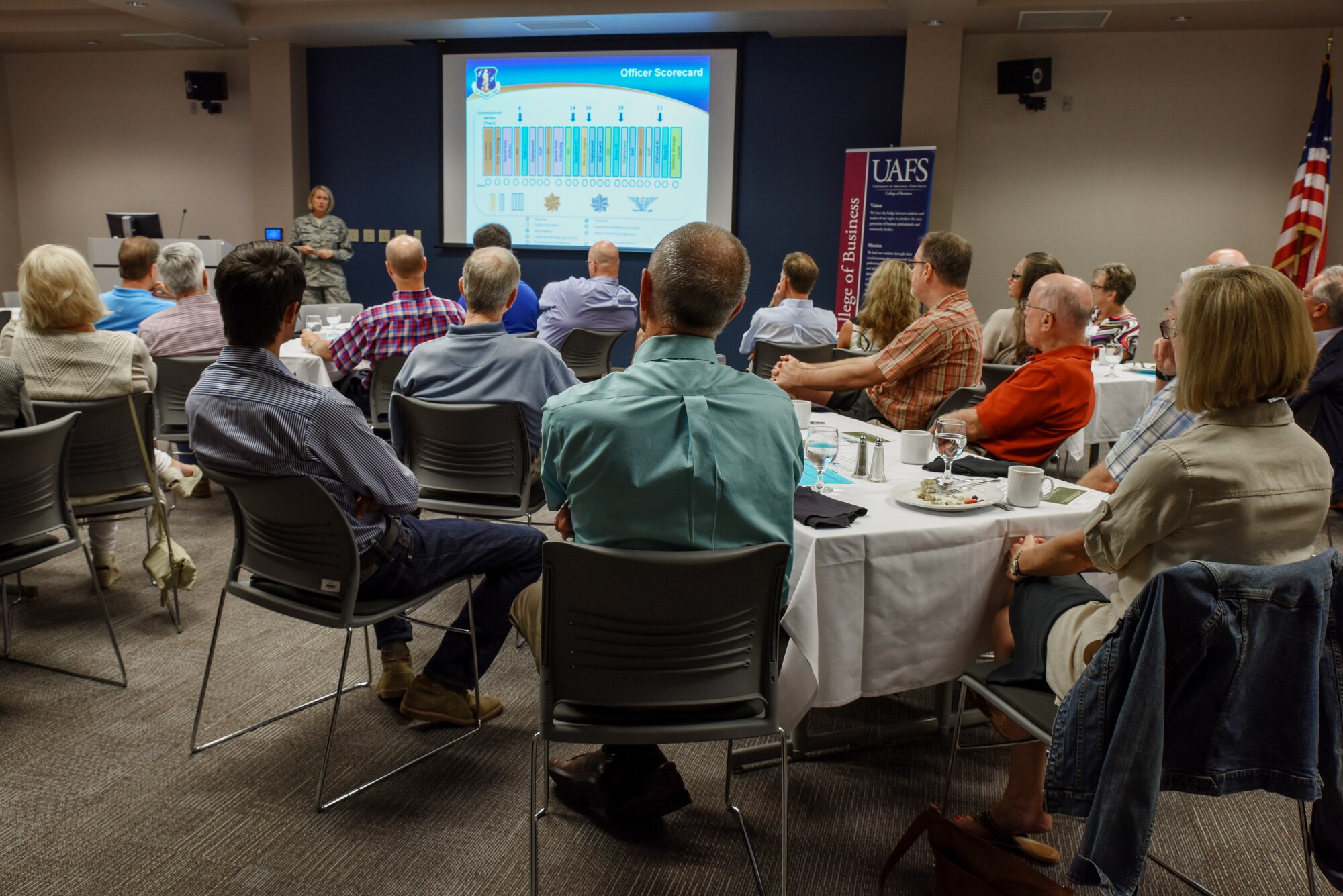 Col. Bobbi J. Doorenbos, 188th Wing commander, gives a presentation on leadership at the multi-generation family enterprise breakfast July 19, 2016, at the University of Arkansas-Fort Smith. The UAFS School of Business hosts quarterly meetings to help local enterprises gain insight on how to better manage their companies.  Doorenbos explained how the Air National Guard creates leaders and establishes career progression for Airmen that civilian companies could emulate to further increase productivity and development. (U.S. Air National Guard photo by Senior Airman Matthew Matlock)