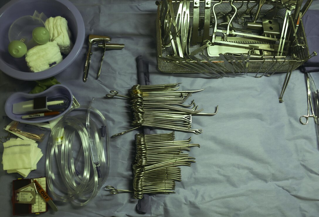 Surgical equipment staged by corpsmen at Camp Kinser, Okinawa, Japan, July 20, 2016. Japanese Ground Self Defense Force Officers observe how U.S. Sailors would use a mobile operating room so that they can take care of personnel at the sight of injury. (U.S. Marine Corps photo by Lance Cpl. Nelson Duenas/ Released)