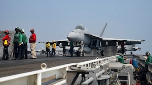 An F/A-18E Super Hornet assigned to the Sidewinders of Strike Fighter Squadron (VFA) 86 prepares to launch from the aircraft carrier USS Dwight D. Eisenhower (CVN 69) in support of air strikes from the Arabian Gulf. Dwight D. Eisenhower and its carrier strike group are deployed in support of Operation Inherent Resolve, maritime security operations and theater security cooperation efforts in the U.S. 5th Fleet area of operations. 