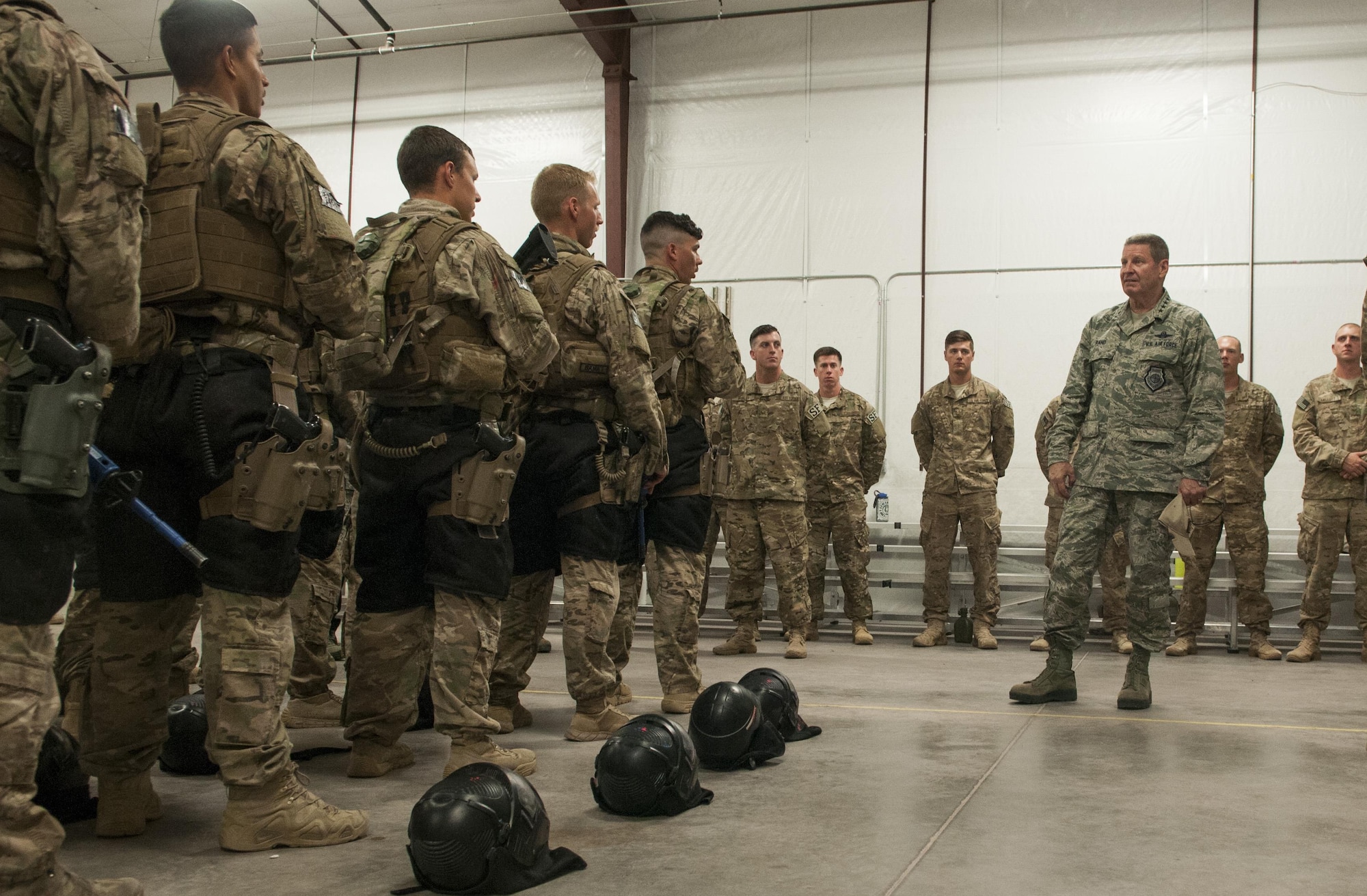 AFGSC Commander Gen. Robin Rand addresses Airmen at the 620th Ground Combat Training Squadron at Camp Guernsey, Wyo., July 21, 2016. Rand’s visit included a stop at the shoot house where Airmen demonstrated their tactical capabilities. (U.S. Air Force photo by Senior Airman Malcolm Mayfield)