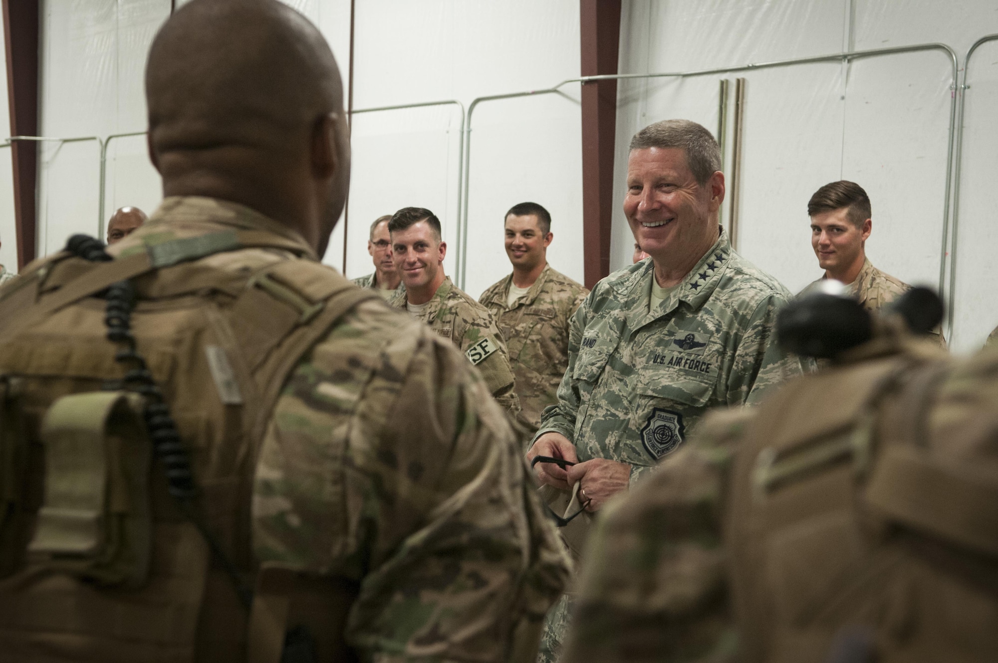 AFGSC Commander Gen. Robin Rand addresses Airmen at the 620th Ground Combat Training Squadron at Camp Guernsey, Wyo., July 21, 2016. Rand’s visit included a stop at the shoot house where Airmen demonstrated their tactical capabilities. (U.S. Air Force photo by Senior Airman Malcolm Mayfield)