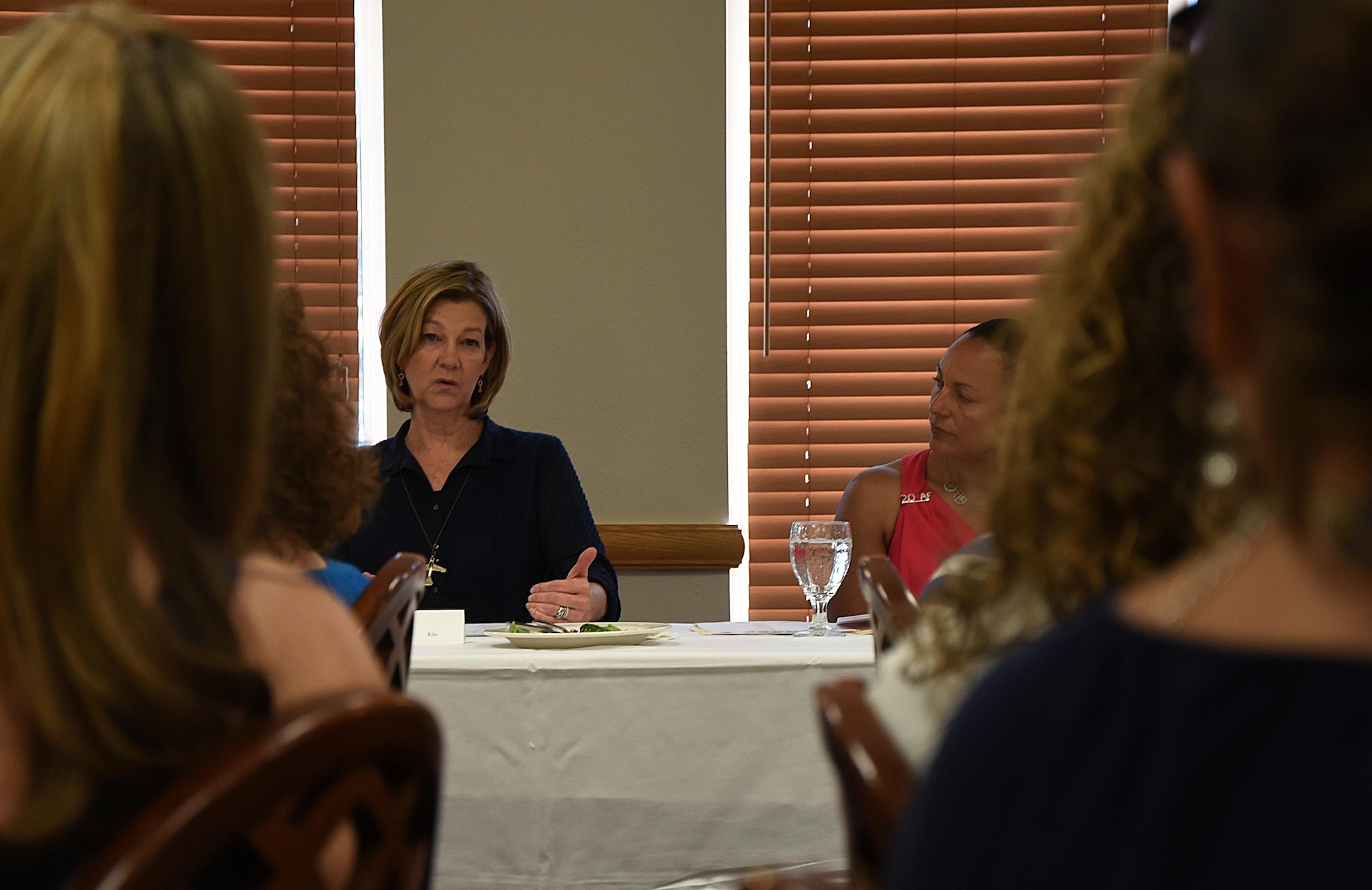 Kim Rand, wife of AFGSC Commander Gen. Robin Rand, talks with 90th Missile Wing key spouses about the importance of the program at Air Force bases July 22, 2016, during a luncheon on F.E. Warren Air Force Base, Wyo. Rand expressed a gratitude towards those who volunteer to help make their squadrons and groups a better place for new spouses. (U.S. Air Force photo by Senior Airman Brandon Valle)