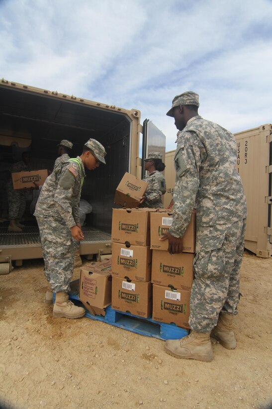 Soldiers with the 282d Quartermaster Company located in Montgomery, Ala., load residual food supplies into a refrigerated connex during WAREX 86-16-03 training, July 19. More than 92 units from across the U.S. Army Reserve, Army National Guard and Active Army are participating in WAREX. The 84th Training Command’s third and final Warrior Exercise of the year, hosted by the 86th Training Division. (U.S. Army Reserve photo by 1st Sgt. Timothy Lawn, 205th Press Camp Headquarters