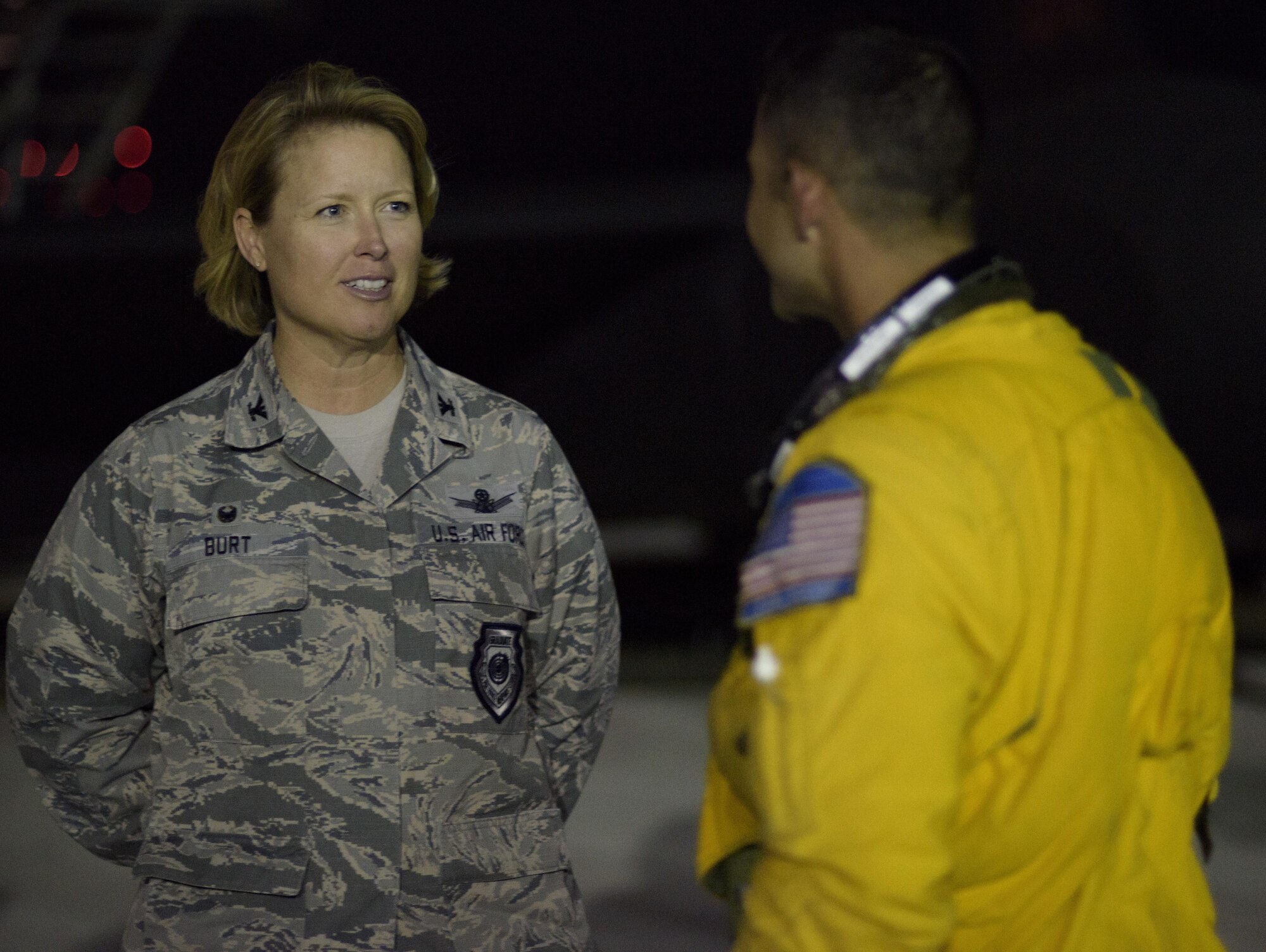 From left, Col. Deanna Burt, the Air Expeditionary Wing commander for exercise Red Flag 16-3 and 50th Space Wing commander, greats Maj. Carl Maymi, a U-2 pilot with the 1st Reconnaissance Squadron from Beale Air Force Base, Cali., on Nellis Air Force Base, Nevada July 18, 2016 after a successful mission. This is the first time in more than 20 years the U-2 has flown in Red Flag while staging out of Nellis Air Force Base. Red Flag 16-3 incorporates air, space and cyberspace forces. (U.S. Air Force photo/Tech. Sgt. David Salanitri)