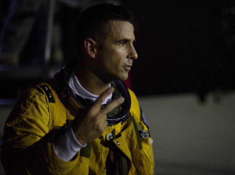 Maj. Carl Maymi, a U-2 pilot with the 1st Reconnaissance Squadron from Beale Air Force Base, Cali., minutes after completing a successful mission for exercise Red Flag 16-3 on Nellis Air Force Base, Nevada July 18, 2016. This is the first time this decade the U-2 has flown in Red Flag while staging out of Nellis Air Force Base. (U.S. Air Force photo/Tech. Sgt. David Salanitri)