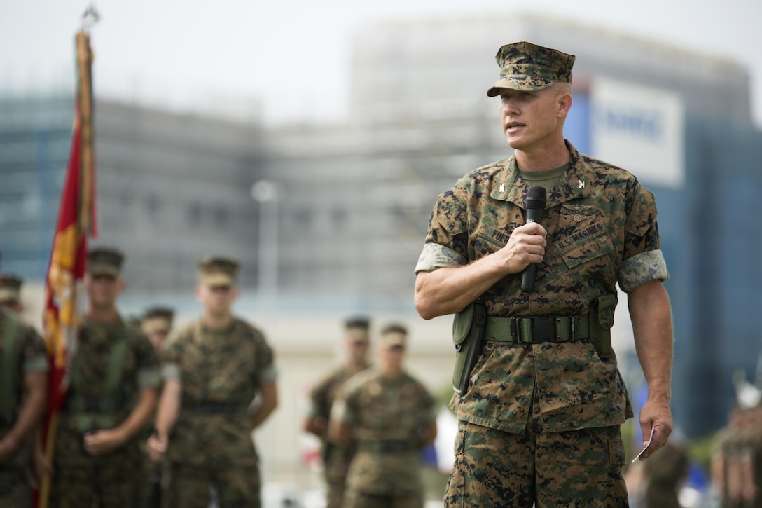 U.S. Marine Corps Col. Richard Fuerst, incoming commanding officer of Marine Corps Air Station Iwakuni, Japan, speaks to audience members at his change of command ceremony at MCAS Iwakuni, July 22, 2016. Residents, locals and guests gathered aboard Marine Corps Air Station Iwakuni, Japan, to witness U.S. Marines and sailors welcome Col. Richard Fuerst as their new commanding officer. (U.S. Marine Corps photo by Lance Cpl. Donato Maffin)