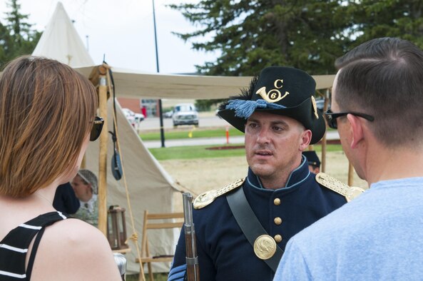 Daniel Mattern, American Civil War re-enactor, talks with guests about military-camp life July 23, 2016, during Fort D.A. Russell Days, the annual F.E. Warren Air Force Base, Wyo., open house. Mattern portrayed a first sergeant in the 6th U.S. Company C infantry. (U.S. Air Force photo by Senior Airman Jason Wiese)