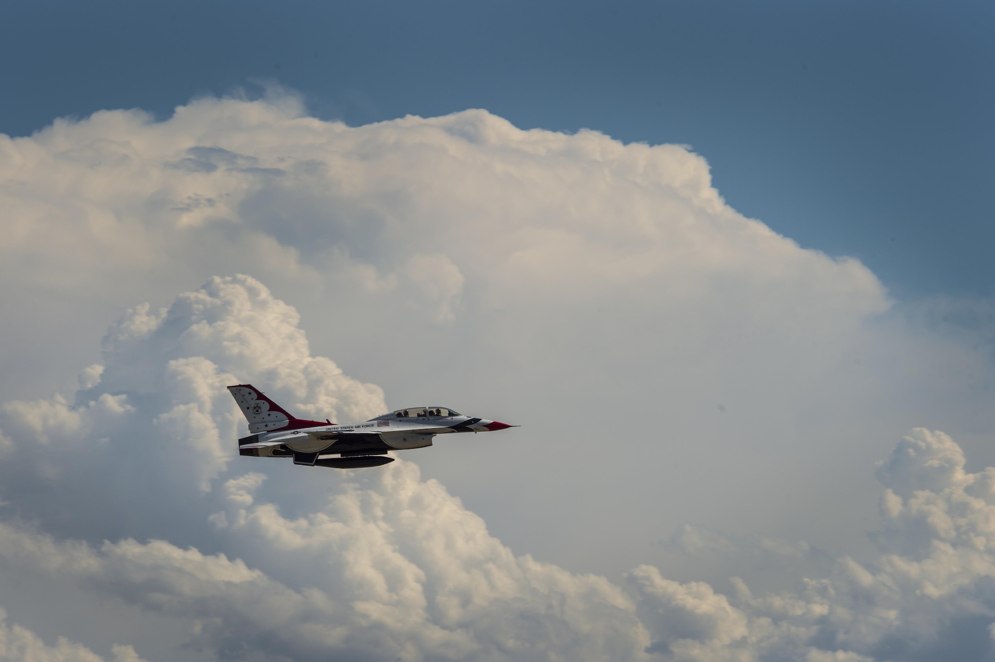 Chancey Williams and Maj. Scott Petz, U.S. Air Force Thunderbirds #8 pilot, soar into the sky during a celebrity flight July 24, 2016, above the Wyoming Air National Guard Base, Cheyenne, Wyo. Williams is an American country music singer-songwriter and a former saddle-bronco rider from Wyoming. (U.S. Air Force photo by Staff Sgt. Christopher Ruano)
