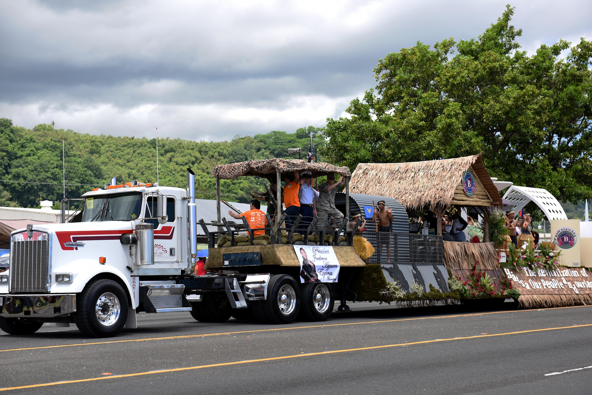 U.S Service members and local citizens participate in the 72nd Guam Liberation Day parade July 21, 2016, in Hagåtña, Guam. Liberation Day is celebrated every year on July 21 to mark the day Guam was liberated by U.S armed forces from Japanese occupation during World War II. (U.S. Air Force photo by Tech Sgt. Richard P. Ebensberger/Released)
