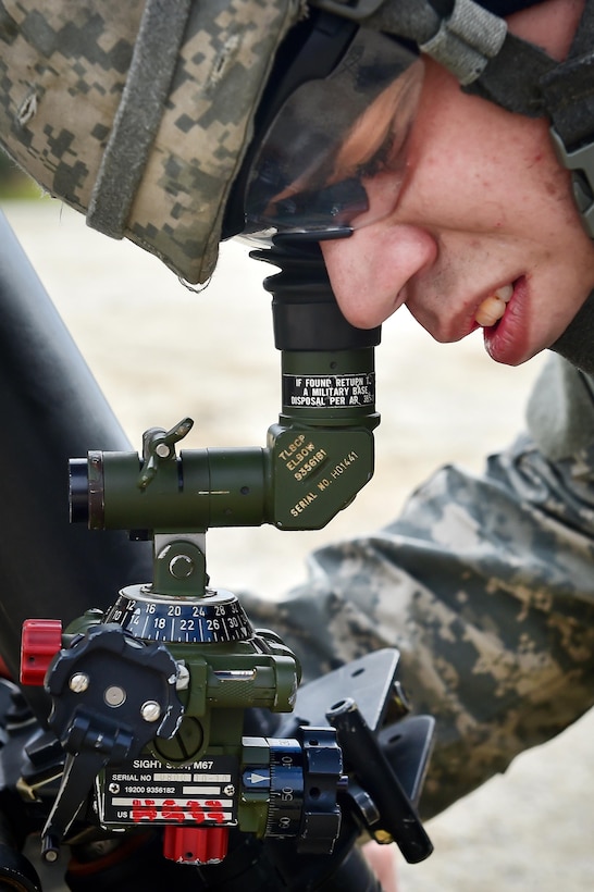 Army Spc. Caleb Clark looks through the sights of an 81 mm mortar during a live-fire exercise at Arctic Anvil 2016 in the Yukon training area near Fort Wainwright, Alaska, July 23, 2016. Clark is assigned to the 25th Infantry Division’s 1st Stryker Brigade Combat Team, Alaska. Air Force photo by Justin Connaher