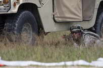 FORT MCCOY, Wis.-- U.S. Army Reserve Soldiers from the 320th Military Police Company, St. Petersburg, Fla., scan their sectors of fire from a Humvee as part of the quick reaction force in a mass casualty scenario during Warrior Exercise 2016 at Fort McCoy, Wis.. More than 92 units from across the U.S Army Reserve, Army National Guard and Active Army are participating in WAREX, the 84th Training Command's third and final Warrior Exercise of the year, hosted by the 86th Training Division. (U.S Army Reserve Photo by Sgt. Devin M. Wood)