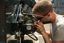 Senior Airman Jensen Reed, 5th Maintenance Squadron aerospace ground equipment journeyman, works on a generator at Minot Air Force Base, N.D., July 20, 2016. AGE specialists play an essential role ensuring Minot AFB’s B-52H Stratofortresses are ready for flight. (U.S. Air Force photo/Senior Airman Apryl Hall)