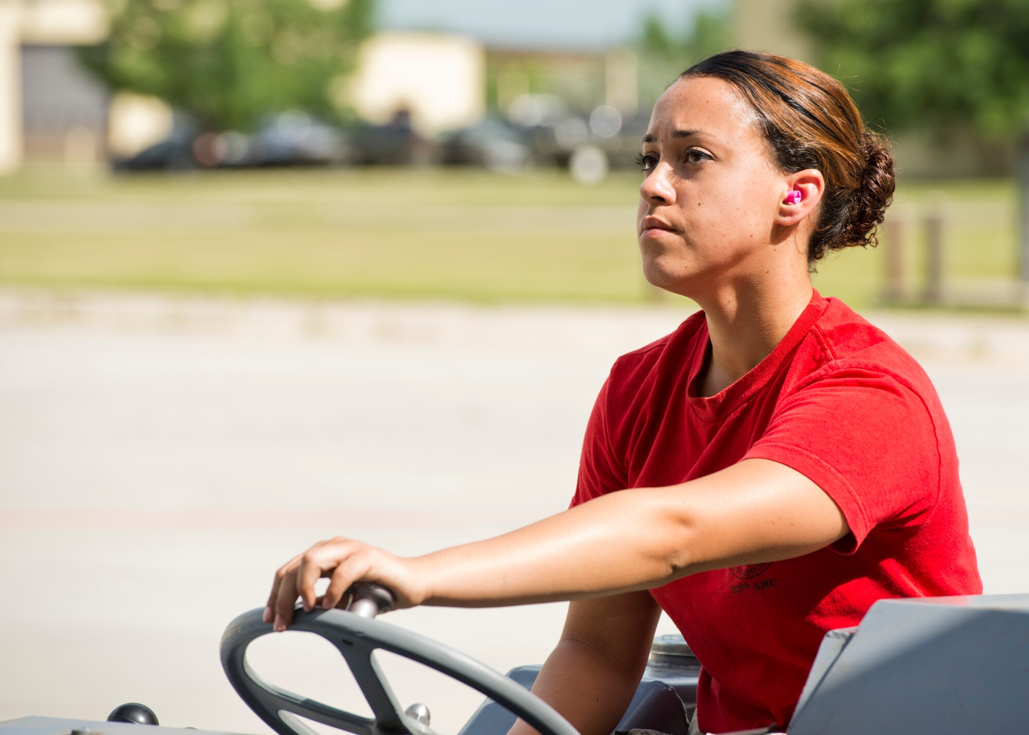 An Airman from the 23rd Aircraft Maintenance Unit load crew operates a MHU-83 “Jammer” to move an inert munition during the Load Crew of the Quarter competition at Dock 7 at Minot Air Force Base, N.D., July 22, 2016. The competition was comprised of four parts: dress and appearance, a loader’s knowledge test, toolbox inspection and the timed bomb load. (U.S. Air Force photo/Airman 1st Class J.T. Armstrong)