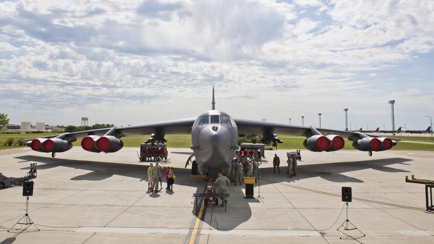 Load crews representing the 23rd Bomb Squadron await the announcement of the winner of the Load Crew of the Quarter competition at Minot Air Force Base, N.D., July 22, 2016. The competition was comprised of four parts: dress and appearance, a loader’s knowledge test, toolbox inspection and the timed bomb load. (U.S. Air Force photo/Airman 1st Class J.T. Armstrong)