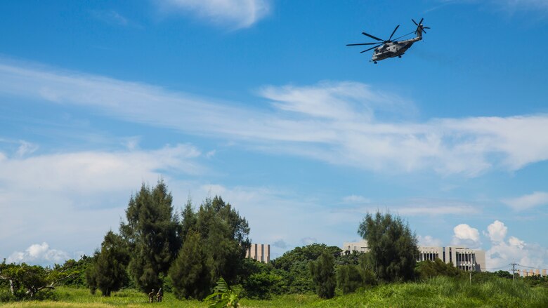 A CH-53E Super Stallion returns to Marine Corps Air Station Futenma July, 22 2016, at Camp Naha, Okinawa, Japan. Marines with Marine Heavy Helicopter Squadron 361, 3rd Marine Aircraft Wing currently deployed with 1st Marine Aircraft Wing as part of the unit deployment program, worked alongside the Japan Self-Defense Force and Okinawa emergency services in Chura-Shima Rescue 2016. The annual exercise hosted by the 15th Brigade, Western Army, Japan Ground Self-Defense Force, trains humanitarian assistance and disaster relief-involved agencies for a swift reaction to a large-scale earthquake and tsunami in Okinawa.