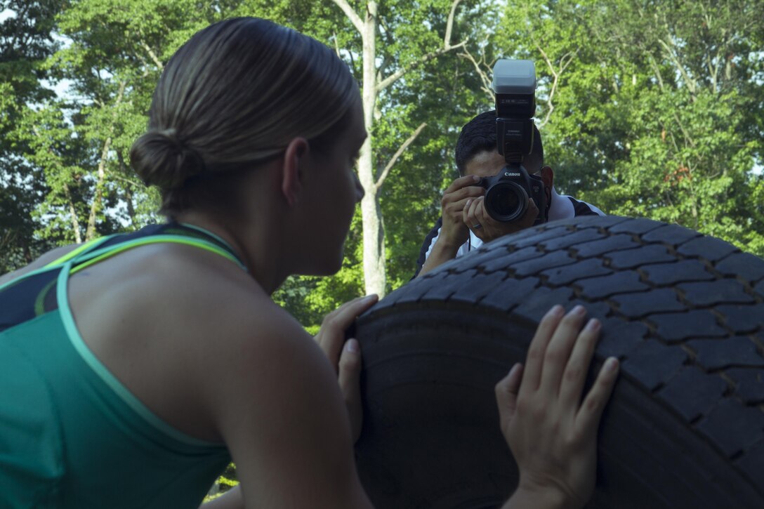 Sergeant John A. Martinez takes photos for Cpl. Logan Block at the Marsh Center aboard Marine Corps Base Quantico, Va., as part of his startup multi-media business that he primarily runs on weekends, July 23, 2016. Martinez began his second career as part of a back-up plan in case he is not able to reenlist in the future and expand on his passions for art. Martinez is a graphics specialist with Marketing and Public Affairs at Marine Corps Recruiting Command, and a Houston, Texas, native.