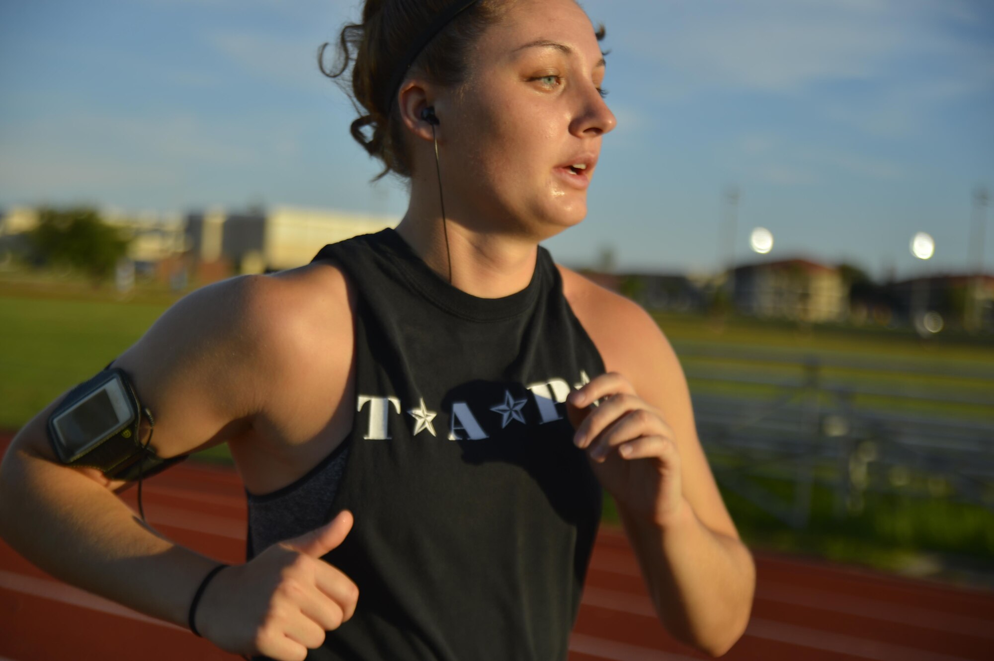 Senior Airman Tori Schultz, photojournalist assigned to the 6th Air Mobility Wing, combats the summer heat by exercising in the morning at MacDill Air Force Base, Fla., July 13, 2016. Small changes to individual exercise routines, such as this, can prevent heat related illness. 