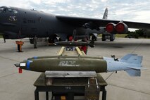 Inert bomb’s rests on the bomb rack of a B-52H Stratofortress at Dock 7 at Minot Air Force Base, N.D., July 22, 2016. The competition was comprised of four parts: dress and appearance, a loader’s knowledge test, toolbox inspection and the timed missile load. (U.S. Air Force photo/Senior Airman Kristoffer Kaubisch)