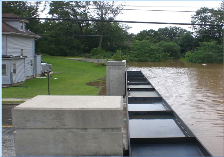 A closure gate  located  on East Street in Downtown Bound Brook in the Borough of Bound Brook is working well during Hurricane Irene in 2011. 