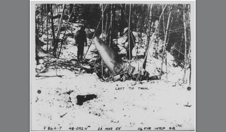 The Washington National Guard F-86 Sabre crash site March 23, 1955, near Timber Mountain, Colville National Forest. Maj. John C. Seeley, ejected from the jet at an altitude of approximately 12,000 after fighting a tight downward spin during the descent. (Courtesy Photo)