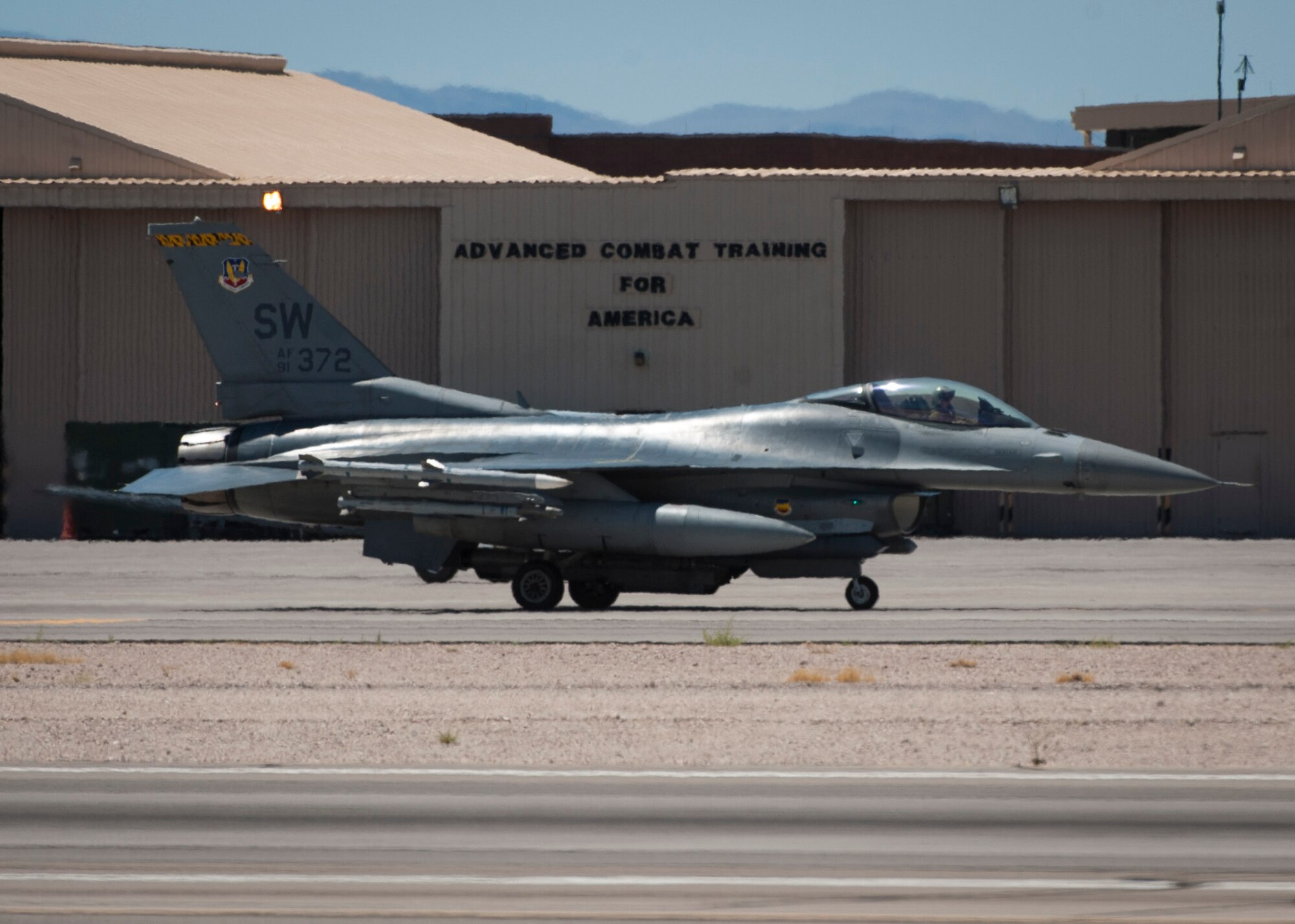 An F-16CJ from the 20th Fighter Wing, Shaw Air Force Base, S.C., taxis down the Nellis Air Force Base, Nev., flightline in preparation for take-off during Red Flag 16-3, July 19, 2016. For Red Flag 16-3, units from the Air Force, Marine Corps and Navy will integrate together to defeat their adversaries while working with air, space and cyberspace counterparts. (U.S. Air Force photo by Senior Airman Jake Carter)